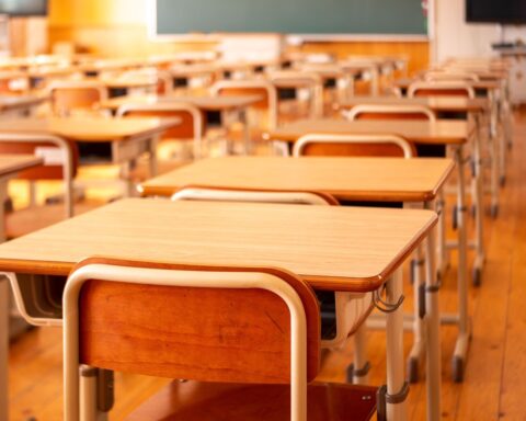 a row of desks in a classroom