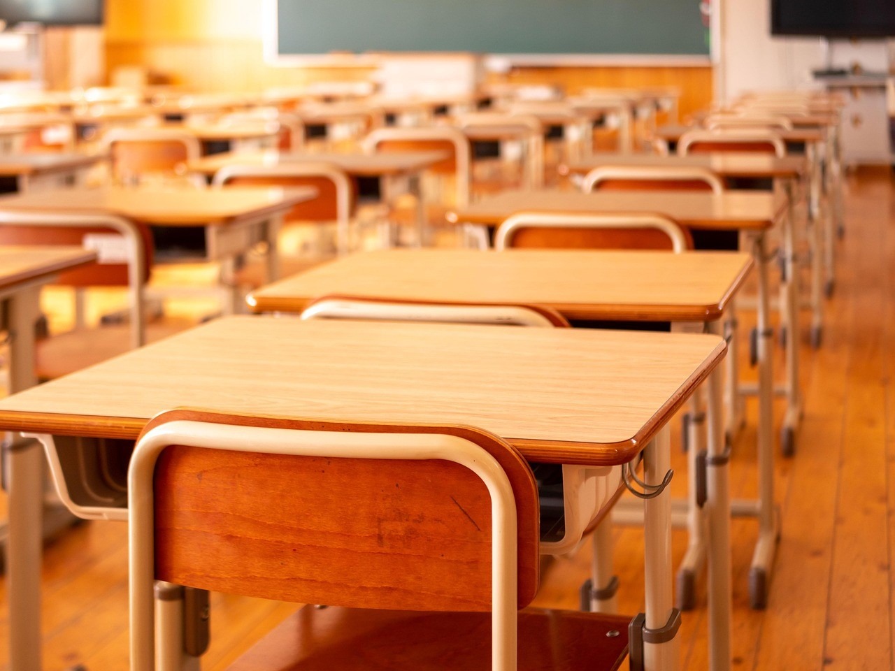 a row of desks in a classroom