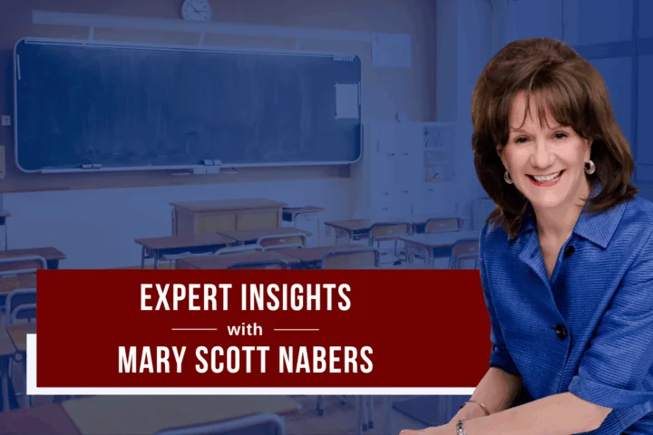 mary scott nabers smiles for a professional headshot in front of a blue graphic showcasing a classroom