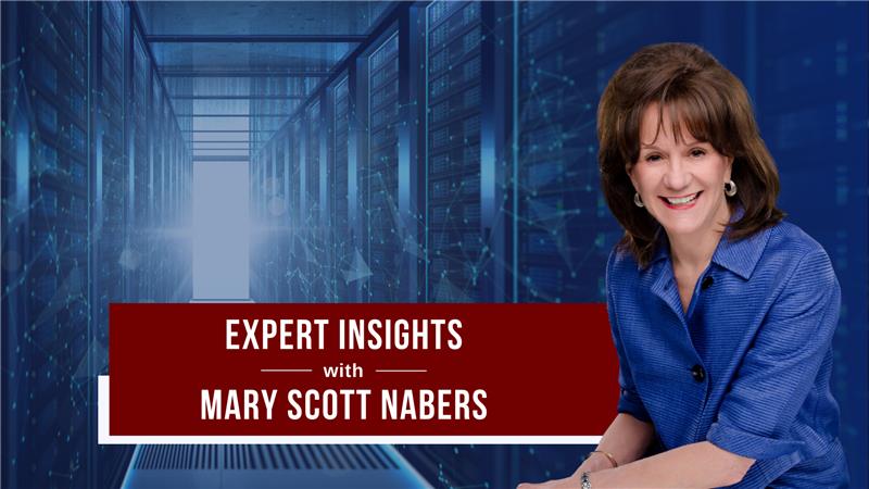mary scott nabers smiles in front of a blue graphic with data storage