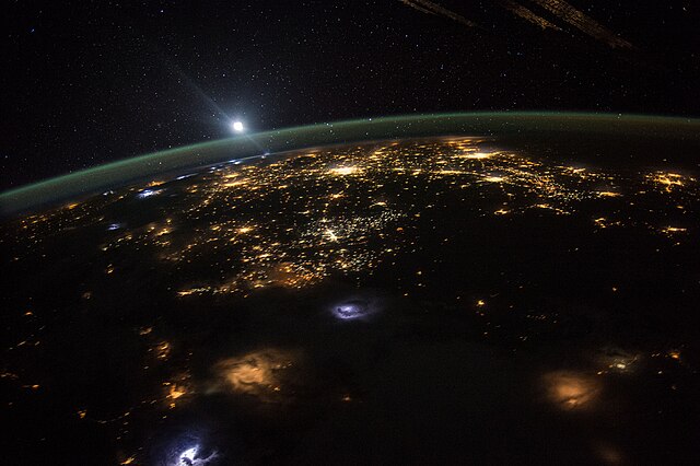 NASA astronaut Scott Kelly took this photograph of a moonrise over the western united states.