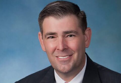 andy gipson smiles for a professional headshot