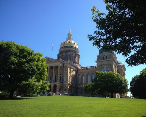 The sun shines on the Iowa State Capitol building.