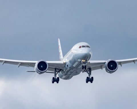 An airplane hovers above Miami-Dade International Airport in Maimi, Florida.