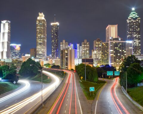 Several highways filled with passing cars lead to the city of Atlanta in Georgia.