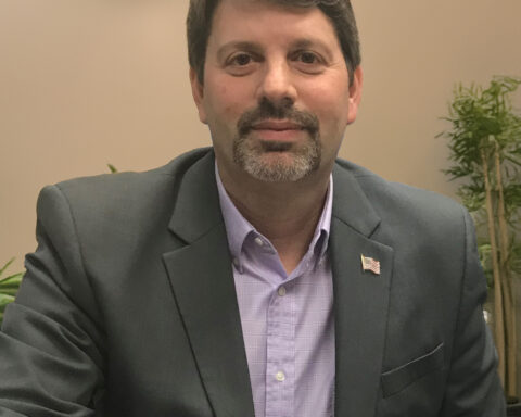 A portrait of Greg Hostetter.