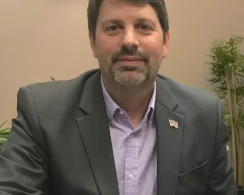 A portrait of Greg Hostetter.