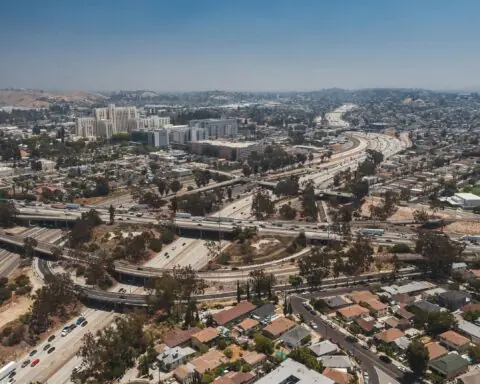 An aerial view of a California highway with intersecting roads and streets in Los Angeles.