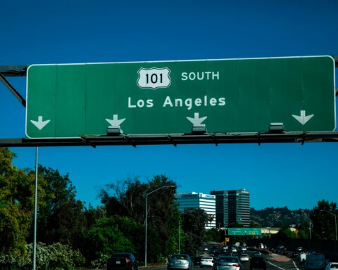 A road sign indicating Los Angeles is ahead for drivers along a road in California.