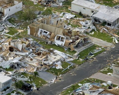 Disaster-damaged homes from an aerial perspective remain after a natural disaster strikes.