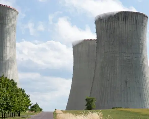Several silos for nuclear reactors and nuclear energy production.