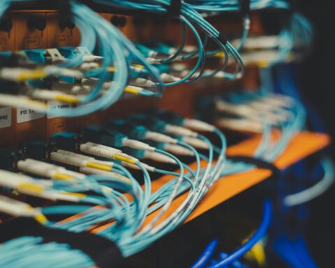 Internet cables connect to a machine.