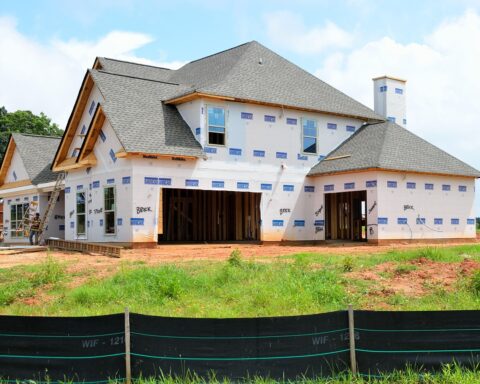 A nearly completed housing structure on a housing development.