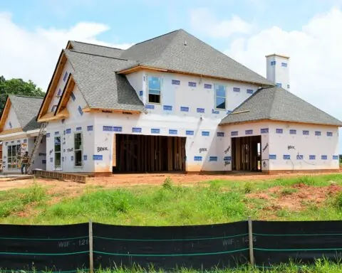 A nearly completed housing structure on a housing development.