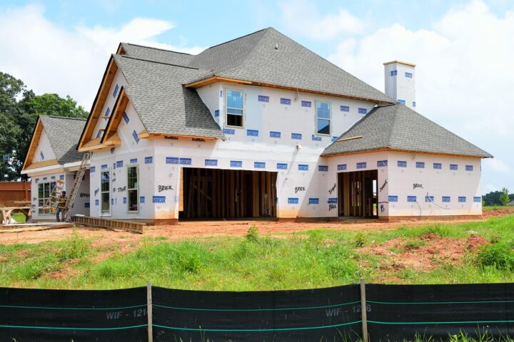 A nearly completed housing structure on a housing development.