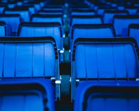 An assortment of blue stadium seats.