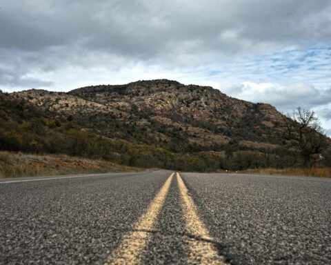 A low shot of an Oklahoma county road.