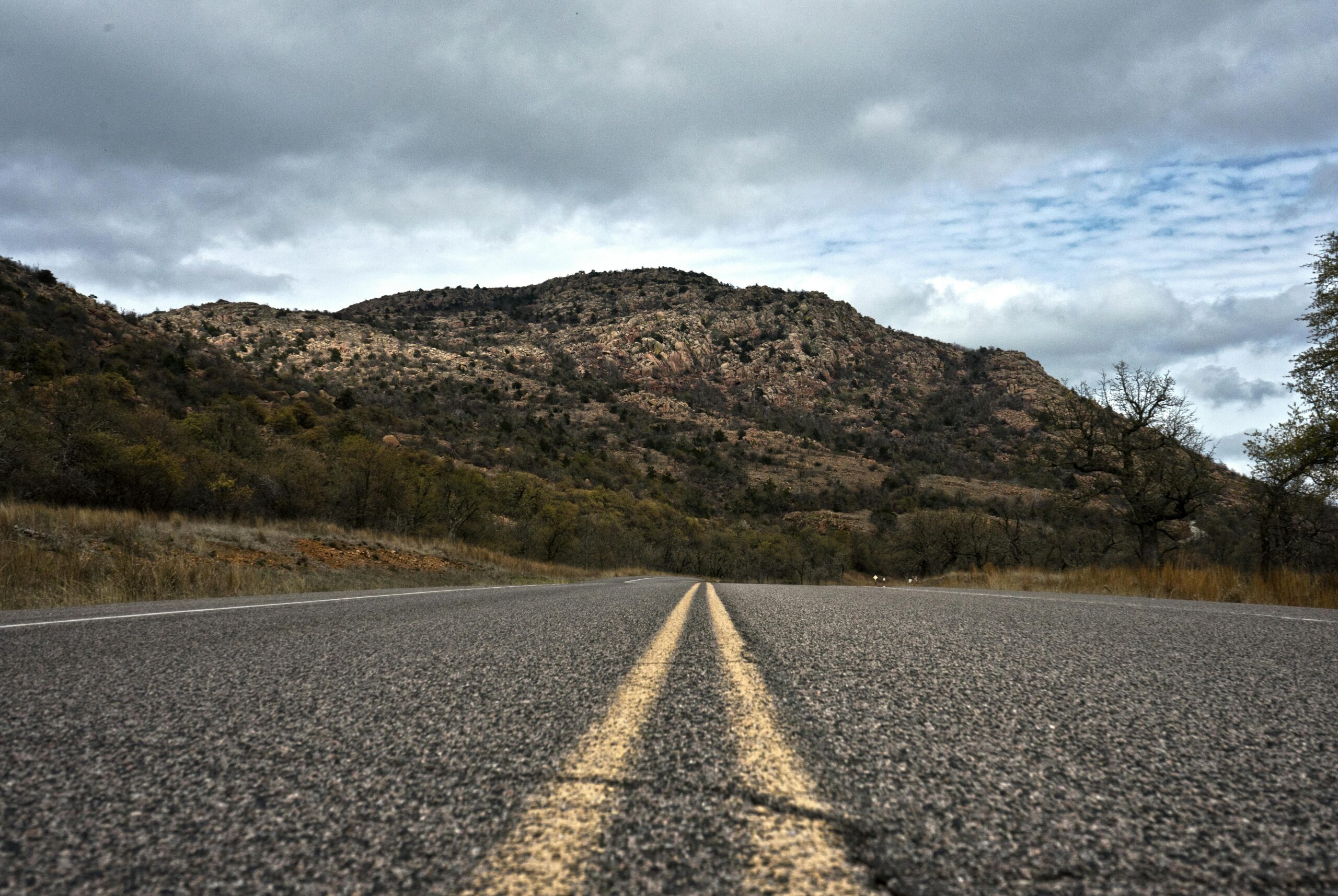 A low shot of an Oklahoma county road.