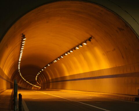 A tunnel with a road from the outside.