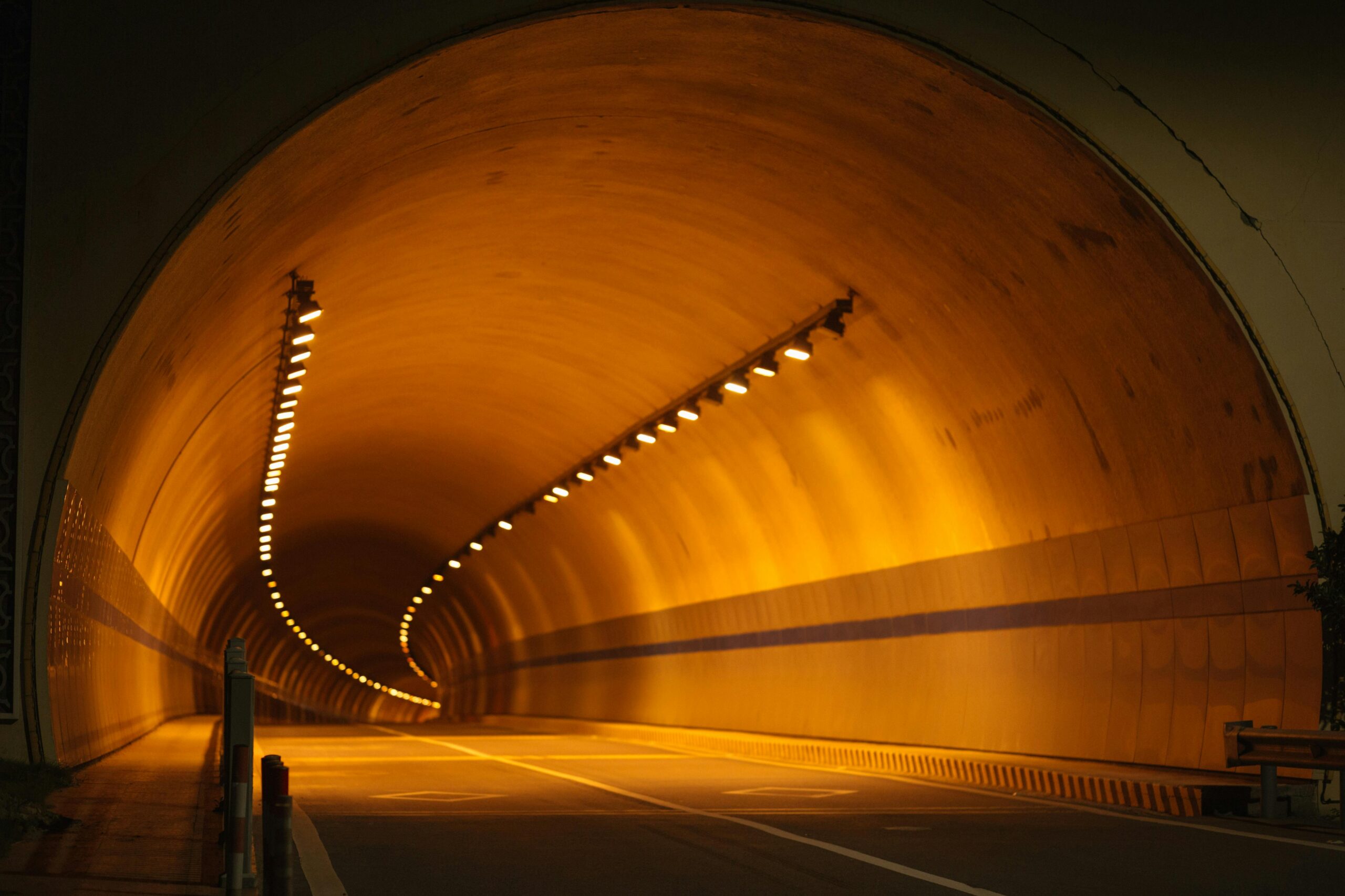 A tunnel with a road from the outside.