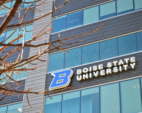 A Boise State University sign on the side of a modern building in Boise, Idaho.