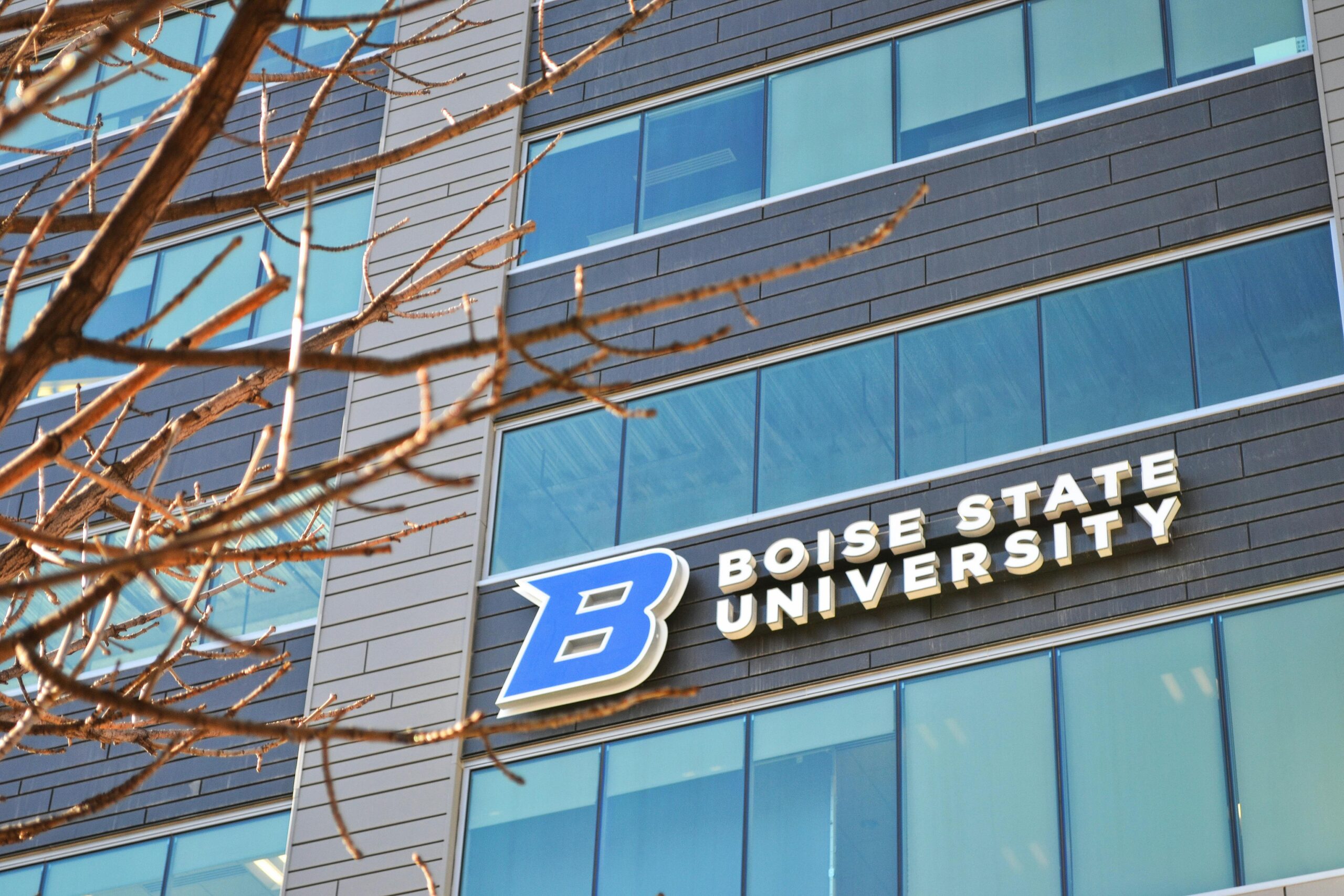 A Boise State University sign on the side of a modern building in Boise, Idaho.