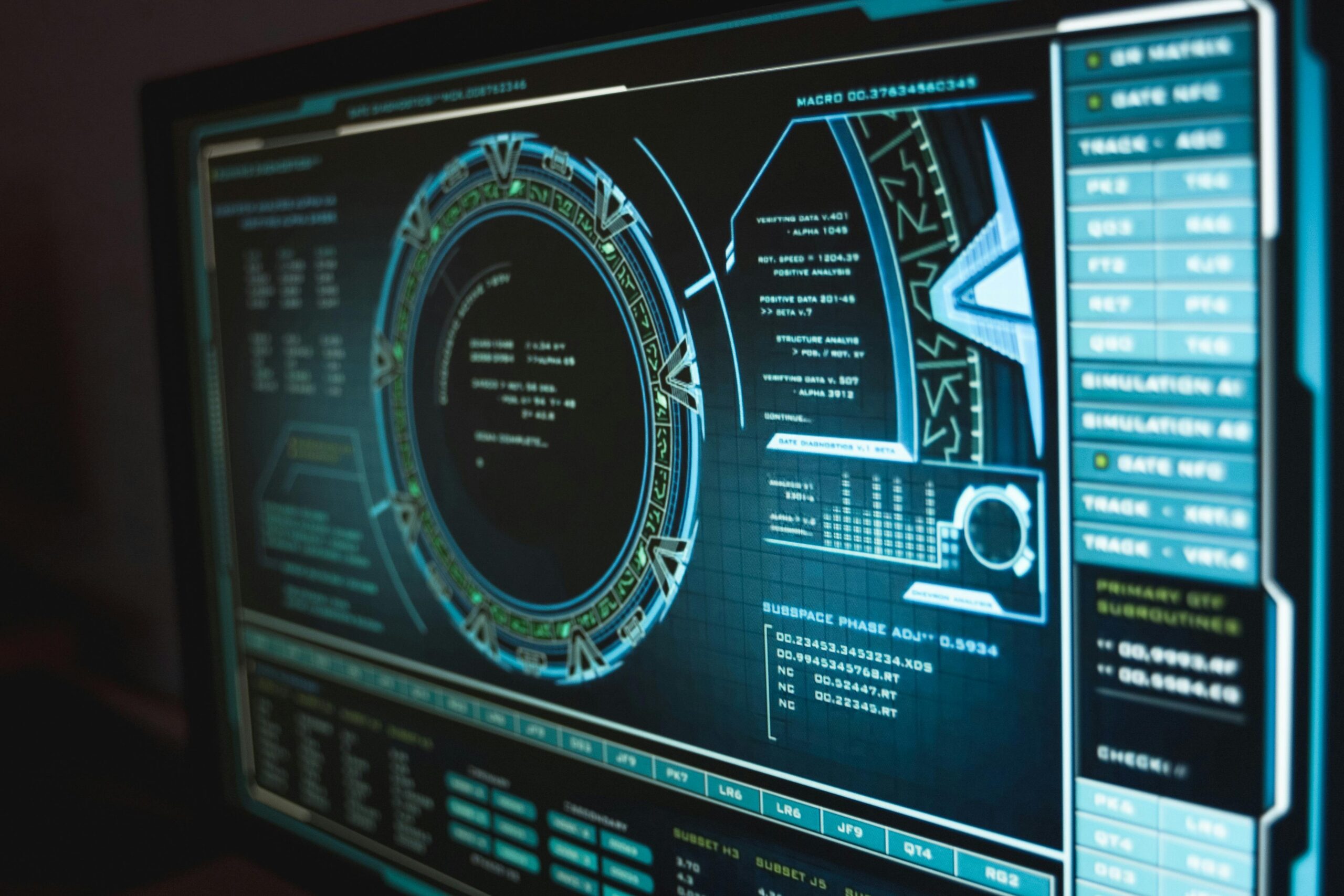 A computer screen shows blue text and digital images to depict hacking or cybersecurity software.