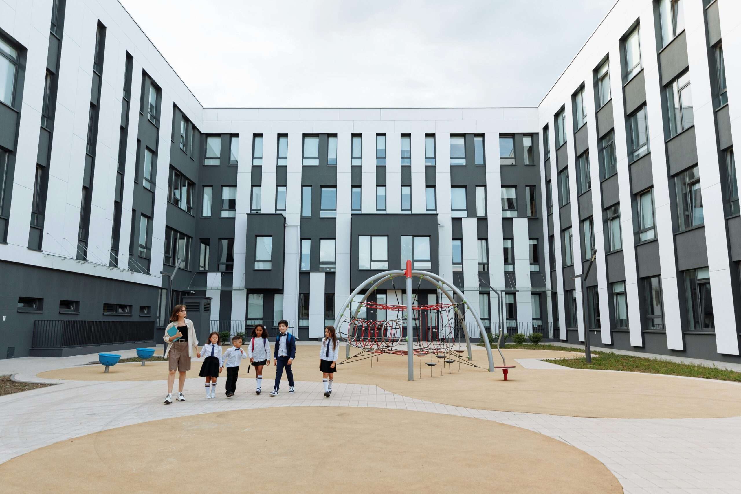 A school courtyard with middle schoolers.