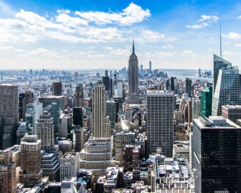 New York City's skyline from a helicopter or drone.