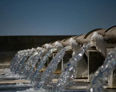 Water pours from several faucets.
