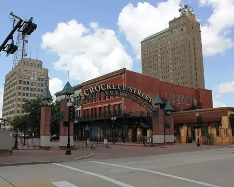 Historic Crockett Street in Beaumont, Texas, on a sunny day form across the street.