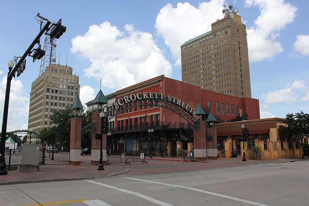 Historic Crockett Street in Beaumont, Texas, on a sunny day form across the street.