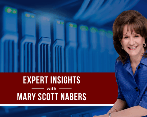 Mary Scott Nabers before a computer mainframe for her weekly column.