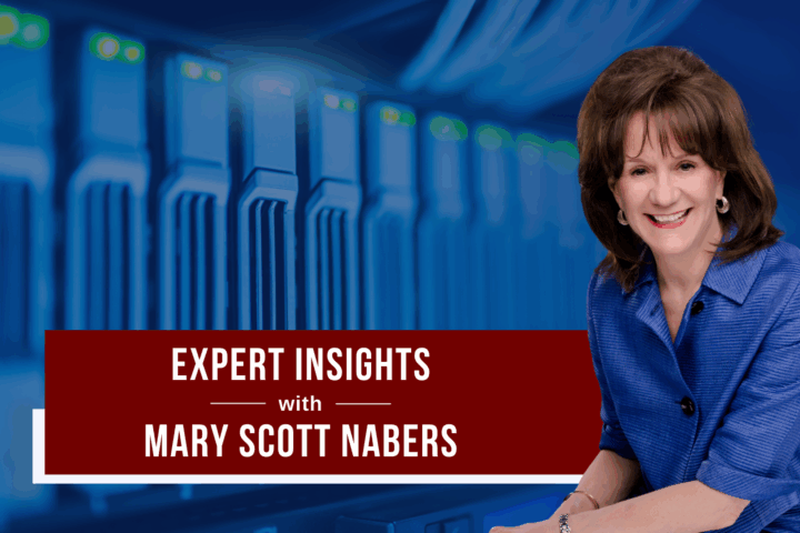 Mary Scott Nabers before a computer mainframe for her weekly column.