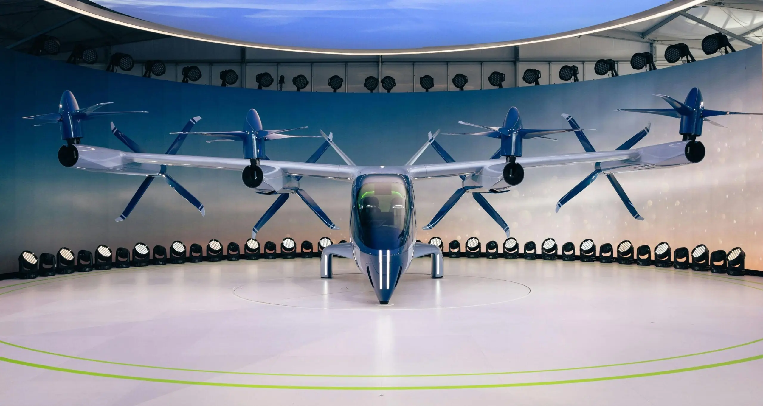 An advanced air mobility vehicle or evtol on display from the front.