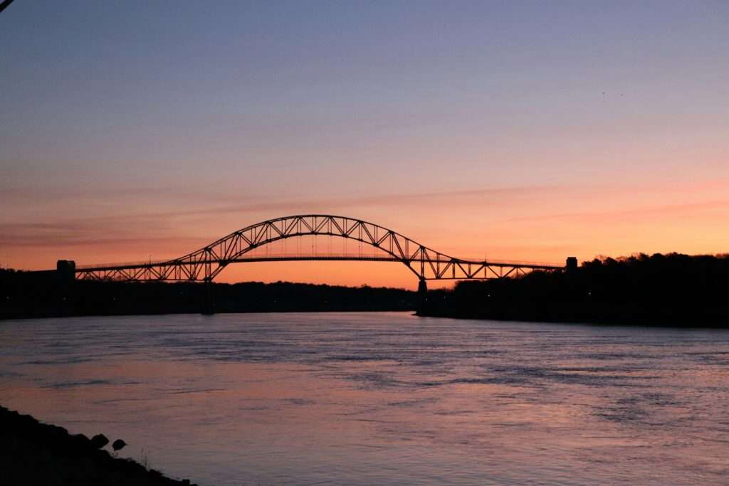 The Bourne Bridge in Bourne, Massachusetts, during sunset.