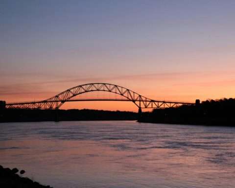 The Bourne Bridge in Bourne, Massachusetts, during sunset.