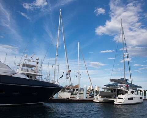 Boats and yachts lined up along the Riviera Beach Marina in Florida.