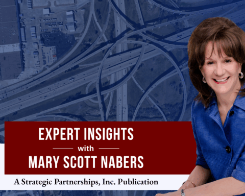 Mary Scott Nabers before an aerial shot of a highway intersection for her weekly column.