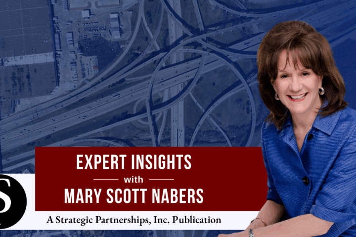Mary Scott Nabers before an aerial shot of a highway intersection for her weekly column.
