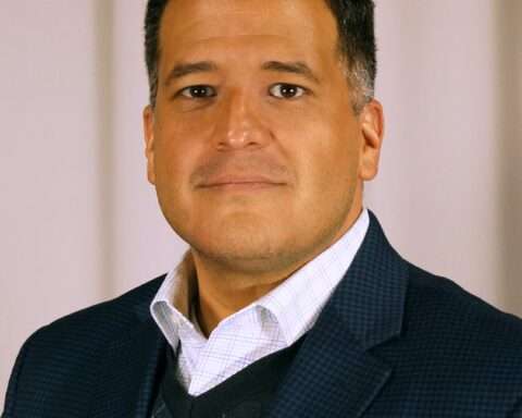 A portrait of José R. Madrigal.