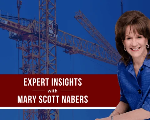 Mary Scott Nabers before construction cranes for her weekly column.