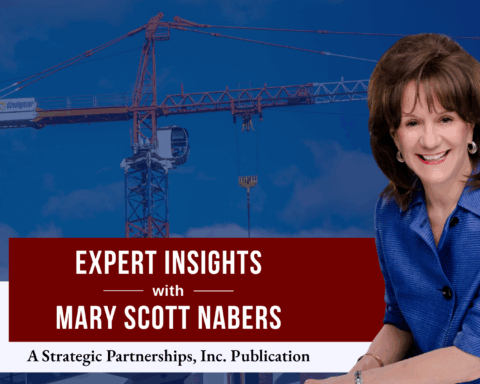 Mary Scott Nabers before a construction crane for her weekly column.