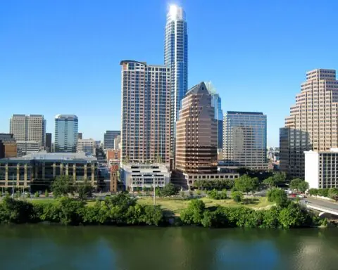 A view of the Austin skyline and Lady Bird Lake from the south.