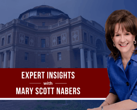 Mary Scott Nabers before a city hall building for her weekly column.