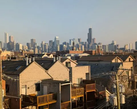 A view of the roofs of housing and businesses throughout Chicago in Illinois.