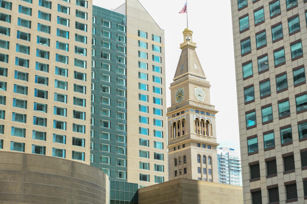 The Bell Tower in Denver, Colorado nearby other sky scrappers.