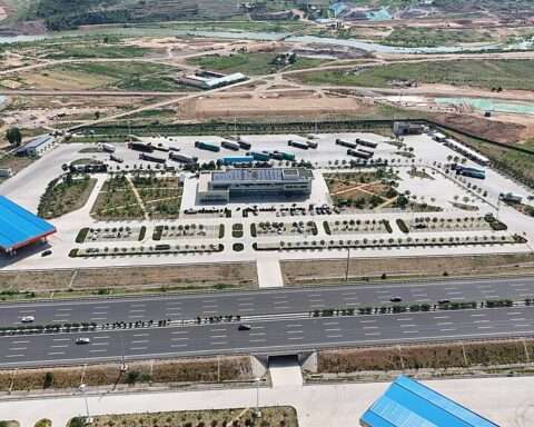 An aerial view of a highway service plaza.