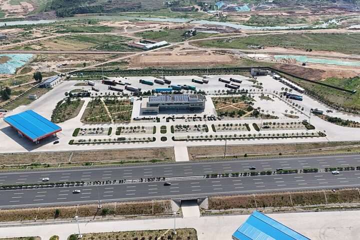 An aerial view of a highway service plaza.