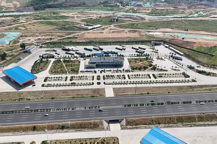 An aerial view of a highway service plaza.
